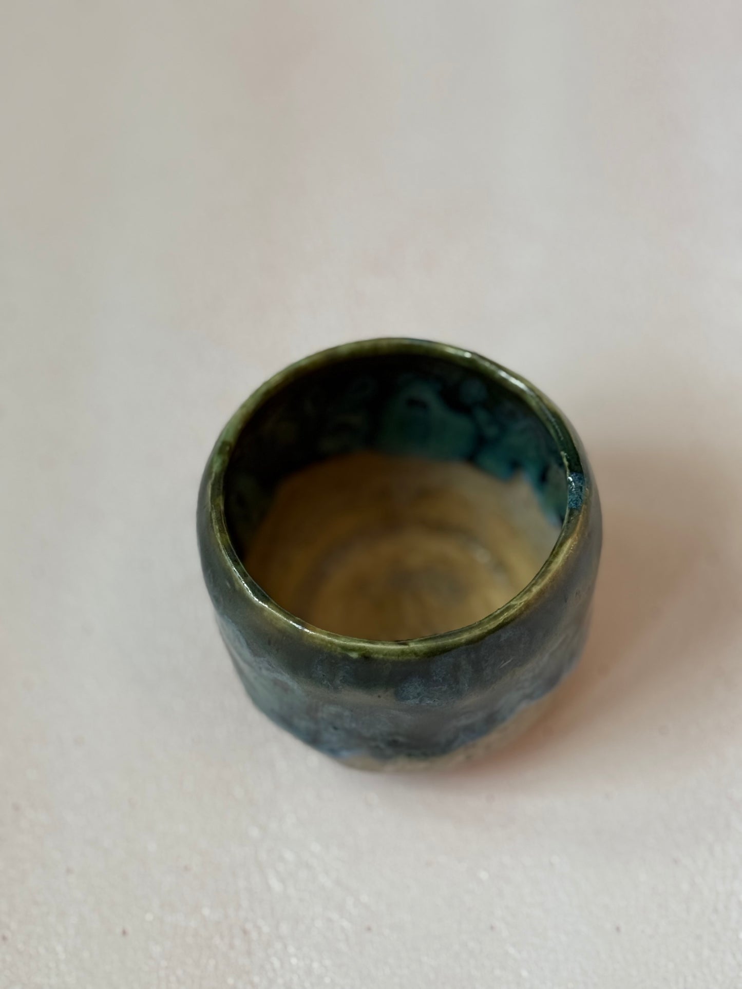 Small hand thrown cup