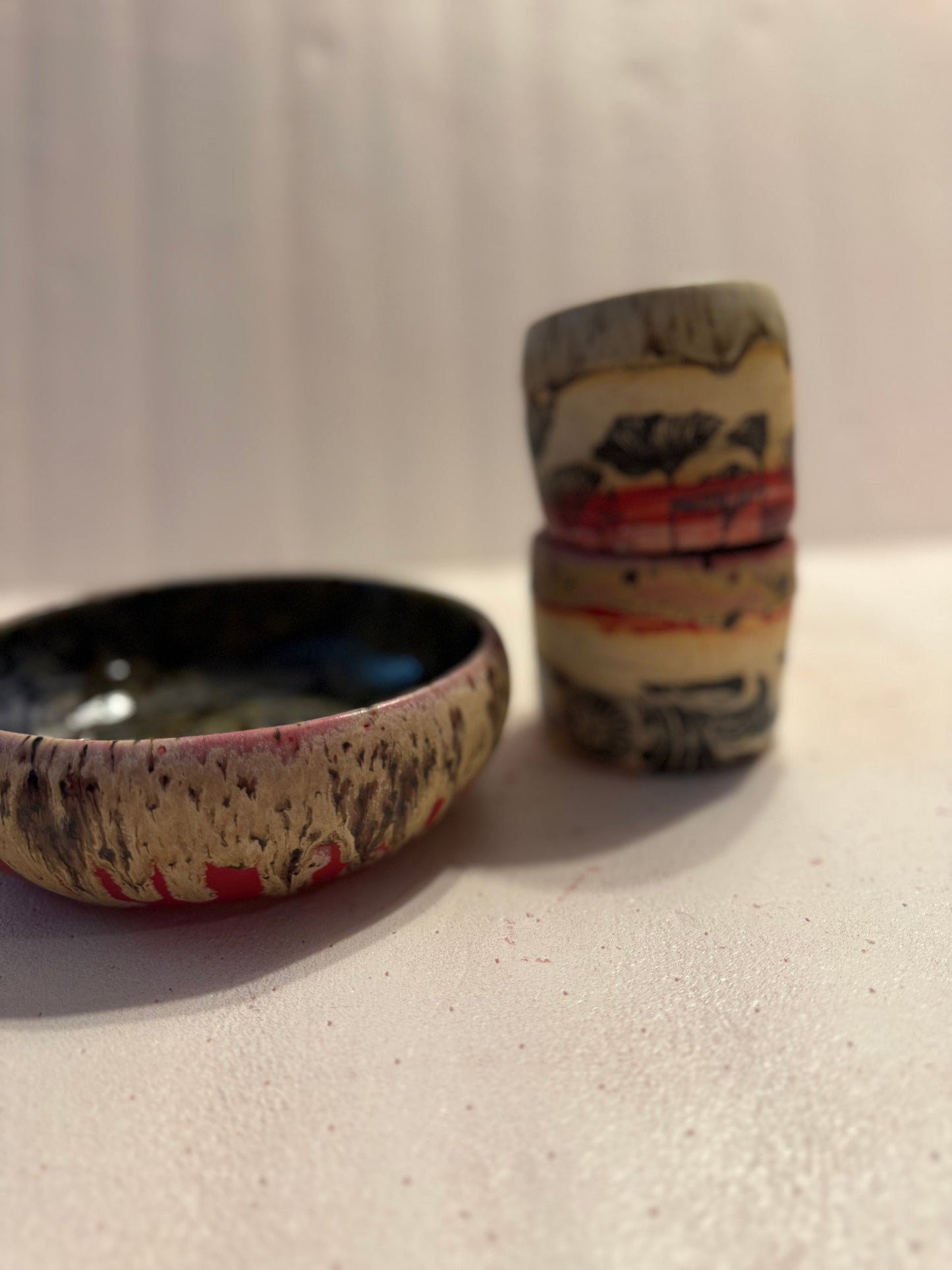 Wide, low bowl- red w/drippy glaze