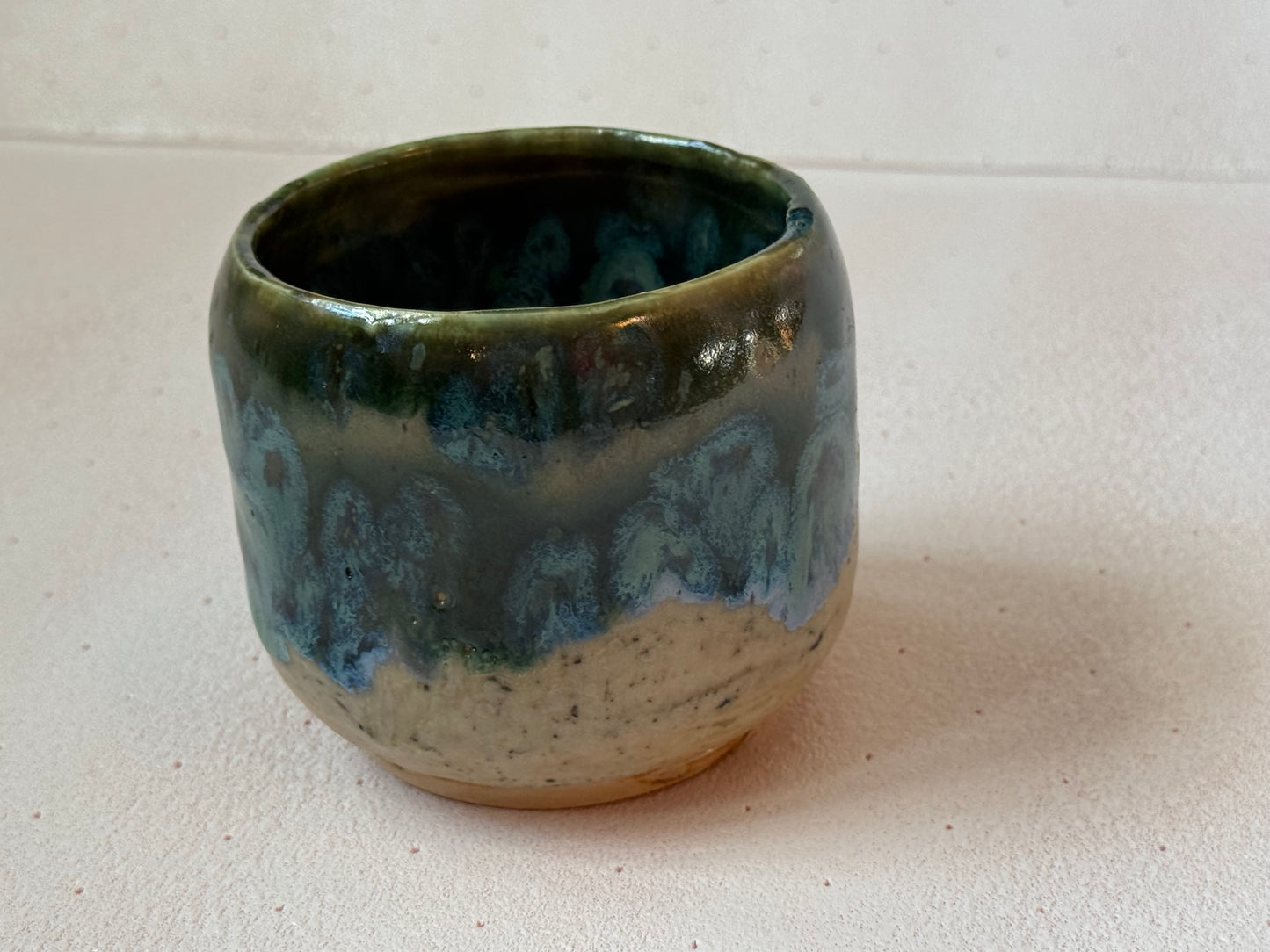 Small hand thrown cup